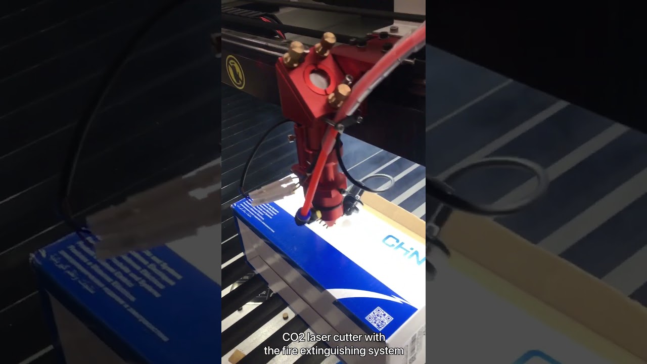CO2 laser cutter with fire extinguishing system.