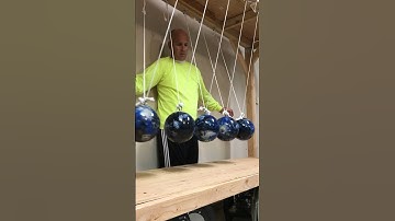 Synchronized collisions with Newton’s Cradle #physics #science