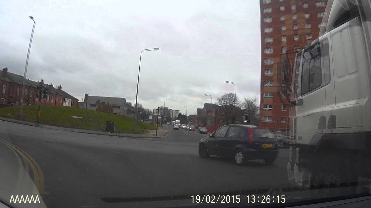 Silly driver goes left from the right hand lane