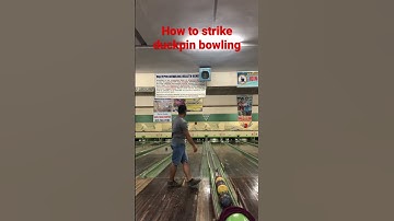 How to strike duckpin bowling?