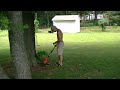 Harold trying out the weed trimmer, Black & Decker Cordless GrassHog