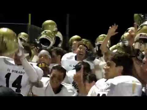 El Dorado Hawks celebrate with the Bell in front of their fans after t