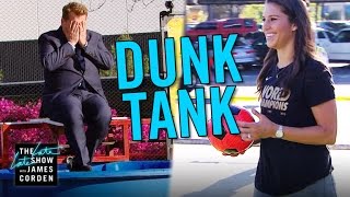Carli Lloyd Kicks Soccer Balls at Dunk Tank