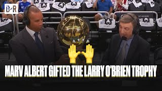 Reggie Miller Presents Marv Albert the Larry O' Brien Trophy