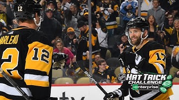 Rust notches 3rd career hatty in Penguins win