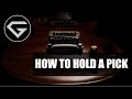 How to hold a pick