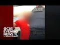 Video shows airline passenger punch flight attendant