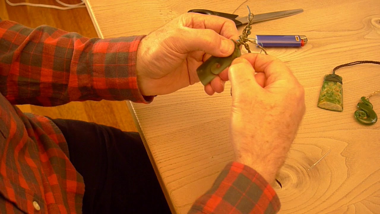 Binding a Toki - a brief clip on how to bind a toki pendant.