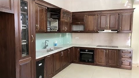 Mẫu tủ bếp gỗ óc chó có bàn đảo và tủ rượu nhà chị Ngân - Nam Định | Nội thất Hpro 098984.6666