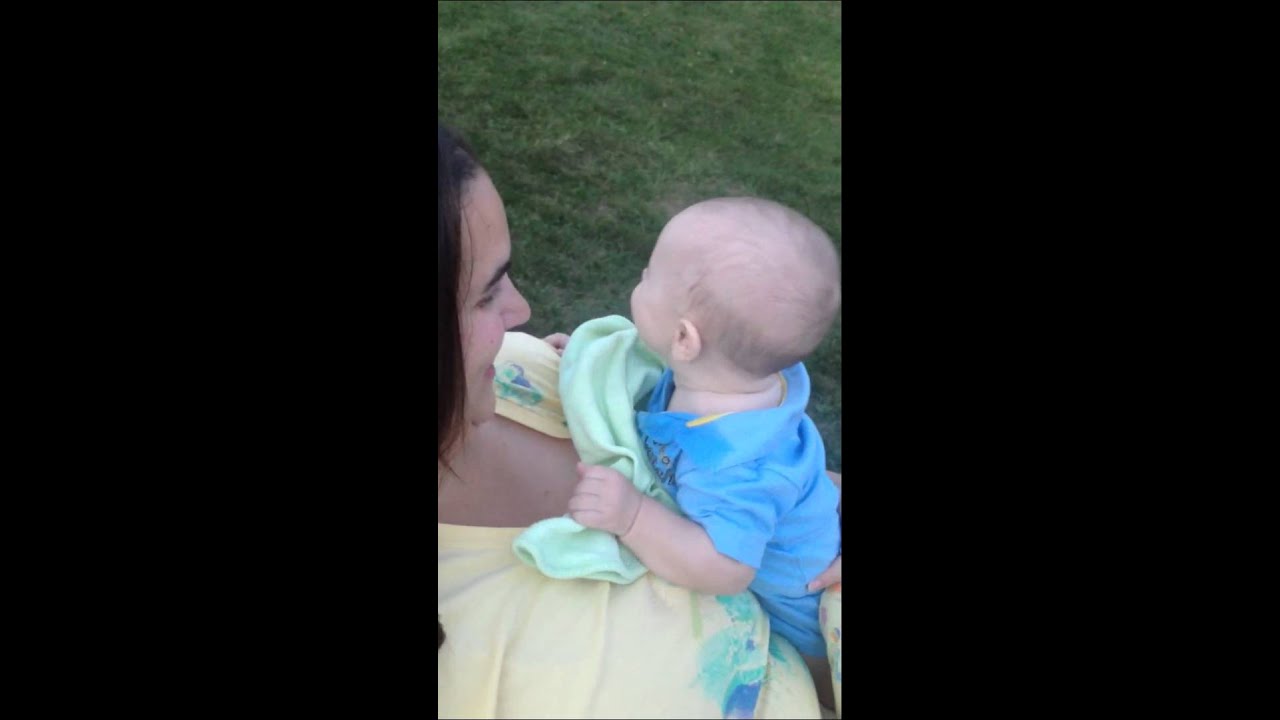 Baby boy laughing at Mom's hiccups