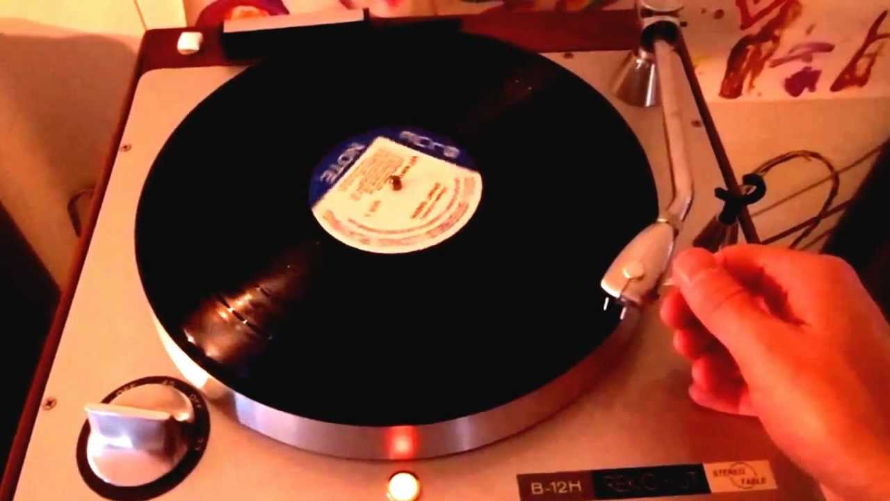 Rek O Kut B-12H Stereo Table record player with factory walnut base and original tone arm