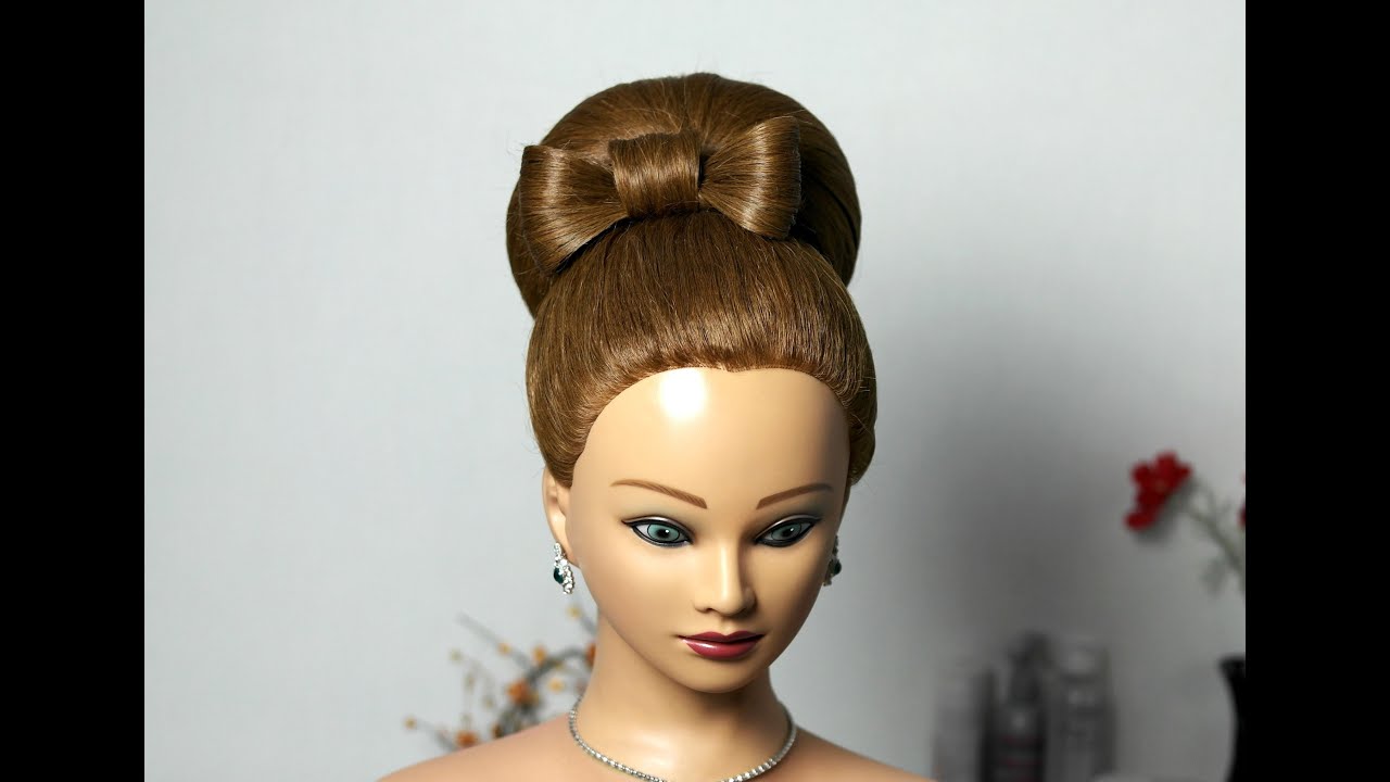 Bun with hair bow for long hair. Updo hairstyle