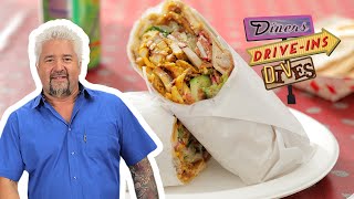 Guy Fieri Eats a Fattoush Chicken Shawarma Wrap | Diners, DriveIns and Dives | Food Network