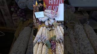 Italian Creamy Blue Cheese and Salami Sausages. Food Fair in Turin, Torino