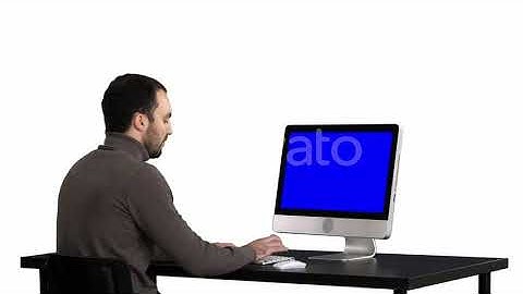 Man typing on the computer white background. Blue Screen | Stock Footage - Videohive