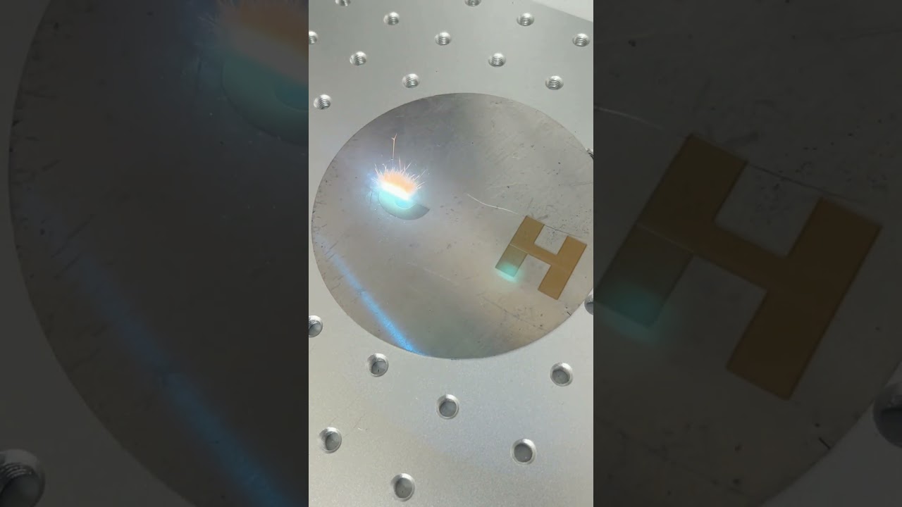 Watch Our Fiber Laser Engrave a Logo on Stainless Steel!