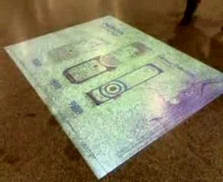 This clip is of an interactive advertisment planted in a busy subway (SMRT/SBS Transit) station. It's basically a projector showing ads on the floor with interaction with the people walking by. Check it out!