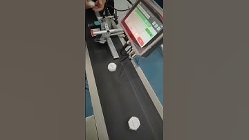 PEKOKO LBX000 HP single-head TIJ printer with conveyor guide rails to mark date on bottle caps