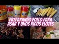 asando pollo y elotes con los vecinos