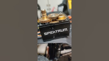 scx6 servo gets 2 lives. drilled new home in gear for stop pin and flipped it 180