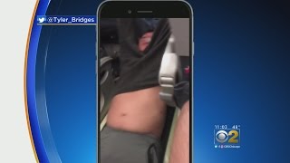 United Airlines Faces Backlash After Man Dragged Off Overbooked Flight