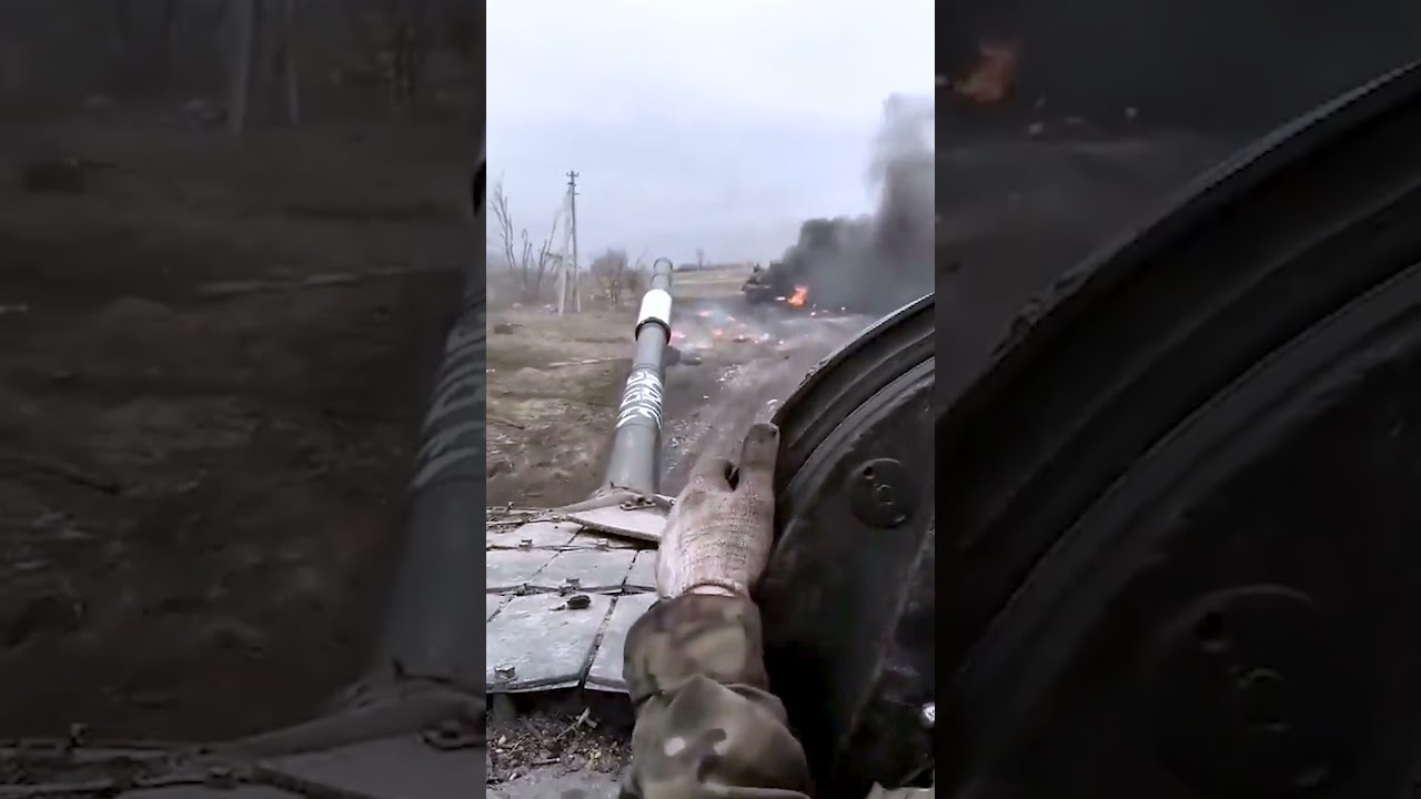 Russian soldiers flee after their T-80 tank is hit by Javelin missile