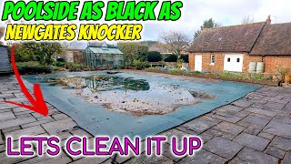 Pressure washing poolside and patio as black as newgates knocker