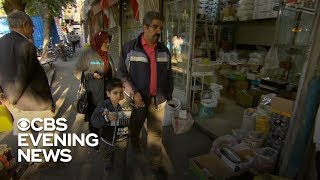 Iranians brace for economic impact of new sanctions