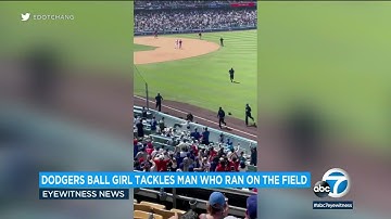Dodgers ballgirl tackles fan on field | ABC7 Los Angeles