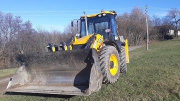 JCB 4cx backhoe loader and Grader repairing gravel roads