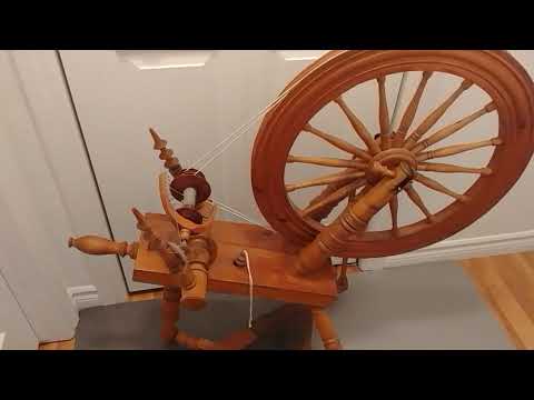 What are the parts of a spinning wheel?