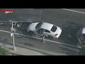 Police chase suspect in custody after being cornered by truck driver mid-pursuit