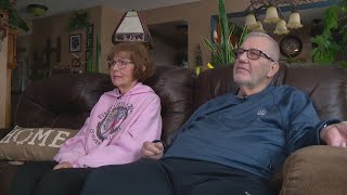 Police officer helps couple after medical emergency