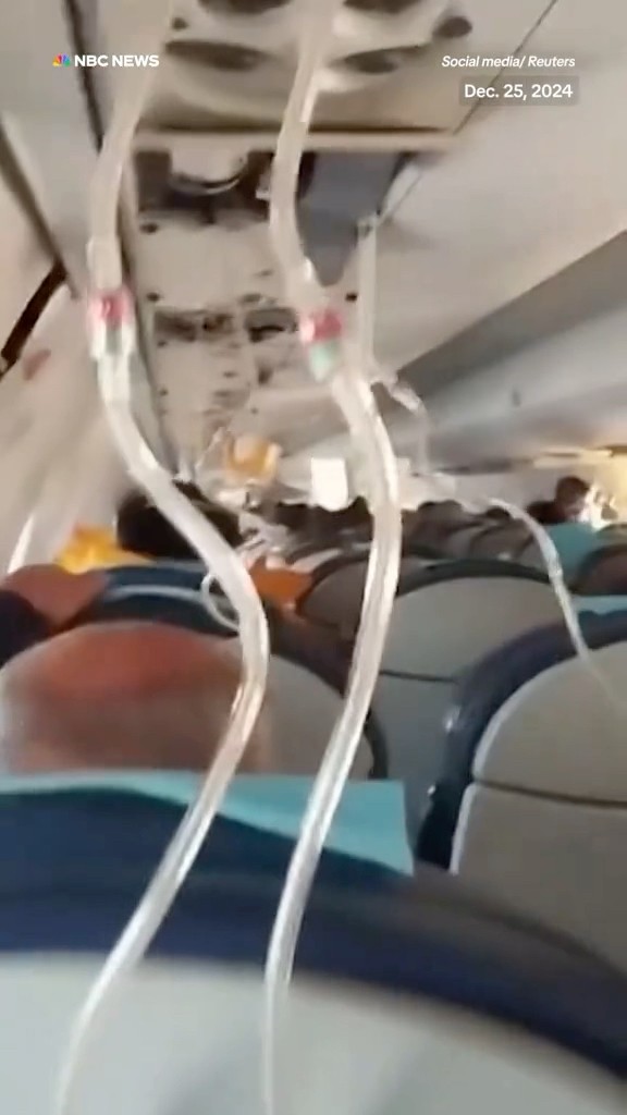 Passengers on an Azerbaijan Airlines were seen wearing masks in the cabin before the plane crashed.