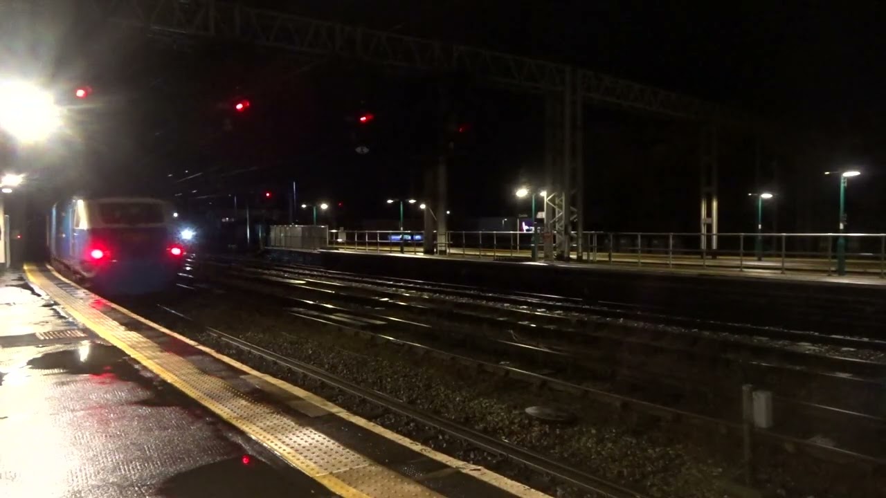 The Class 43 BLUE PULLMAN departing from P4 & Class 88 DRS with Containers passing P3 at Carlisle.