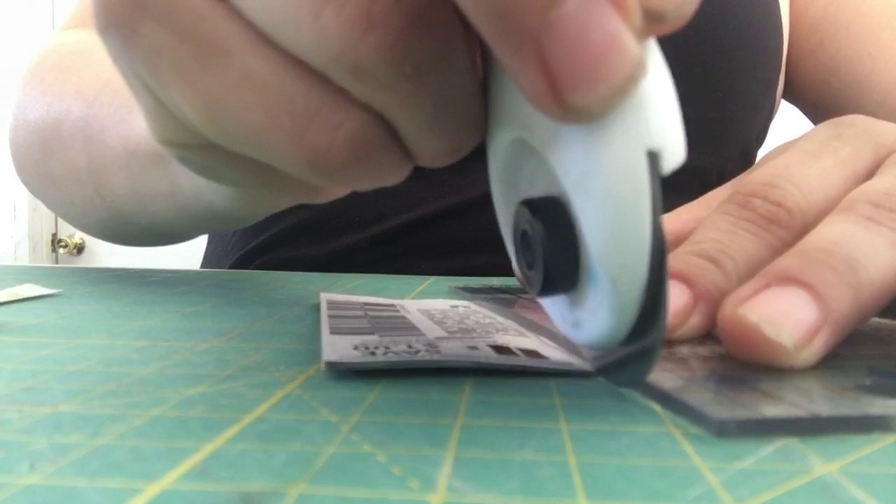 Cutting coupons with fiskars cutter and mat - YouTube