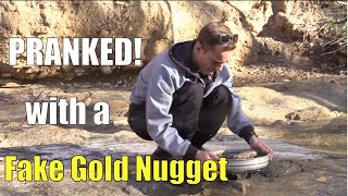Dad pranks son with fake gold nugget while gold prospecting