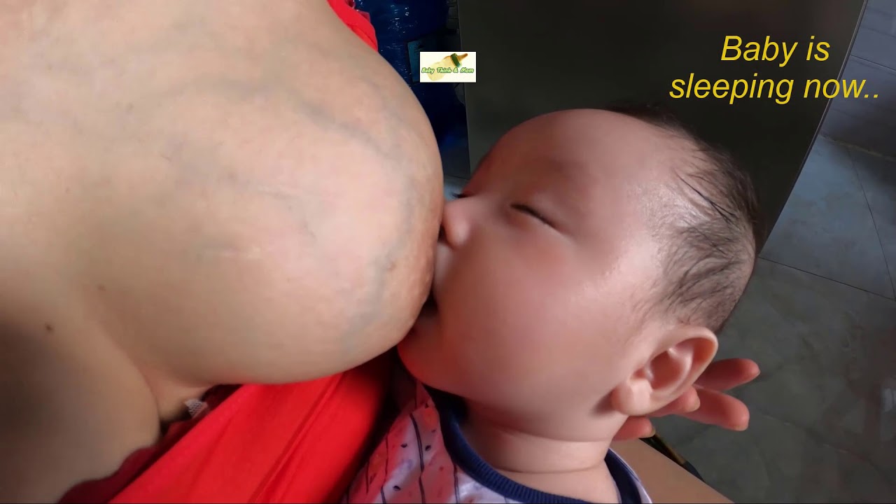 3 months old baby talks to mom Thuy II breastfeeding