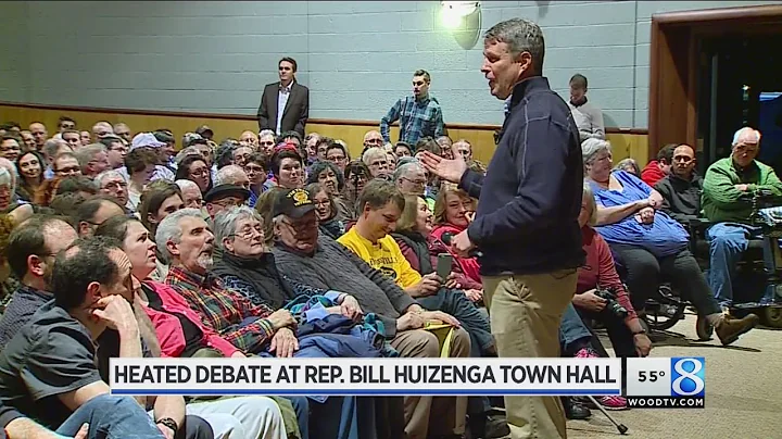 Heated debate at Rep. Huizenga's town hall