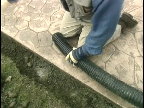 To Drain Water Away From Slab Driveway, How To Fix A Concrete Patio That Holds Water