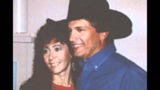 Vignette de la vidéo "George Strait - Stay Out Of My Arms"