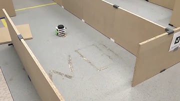 slambot mini robot driving through maze.