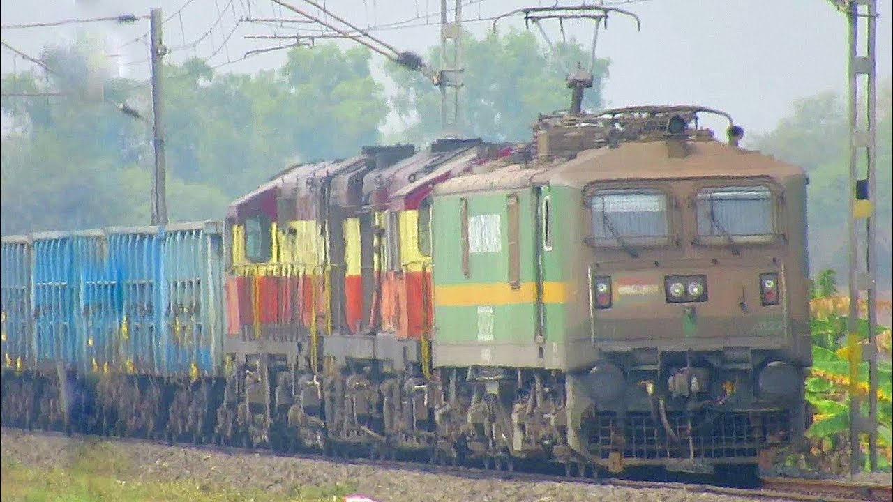 Undertaker WAG9 Hauls Dead Twin ALCOs With A Freight Train