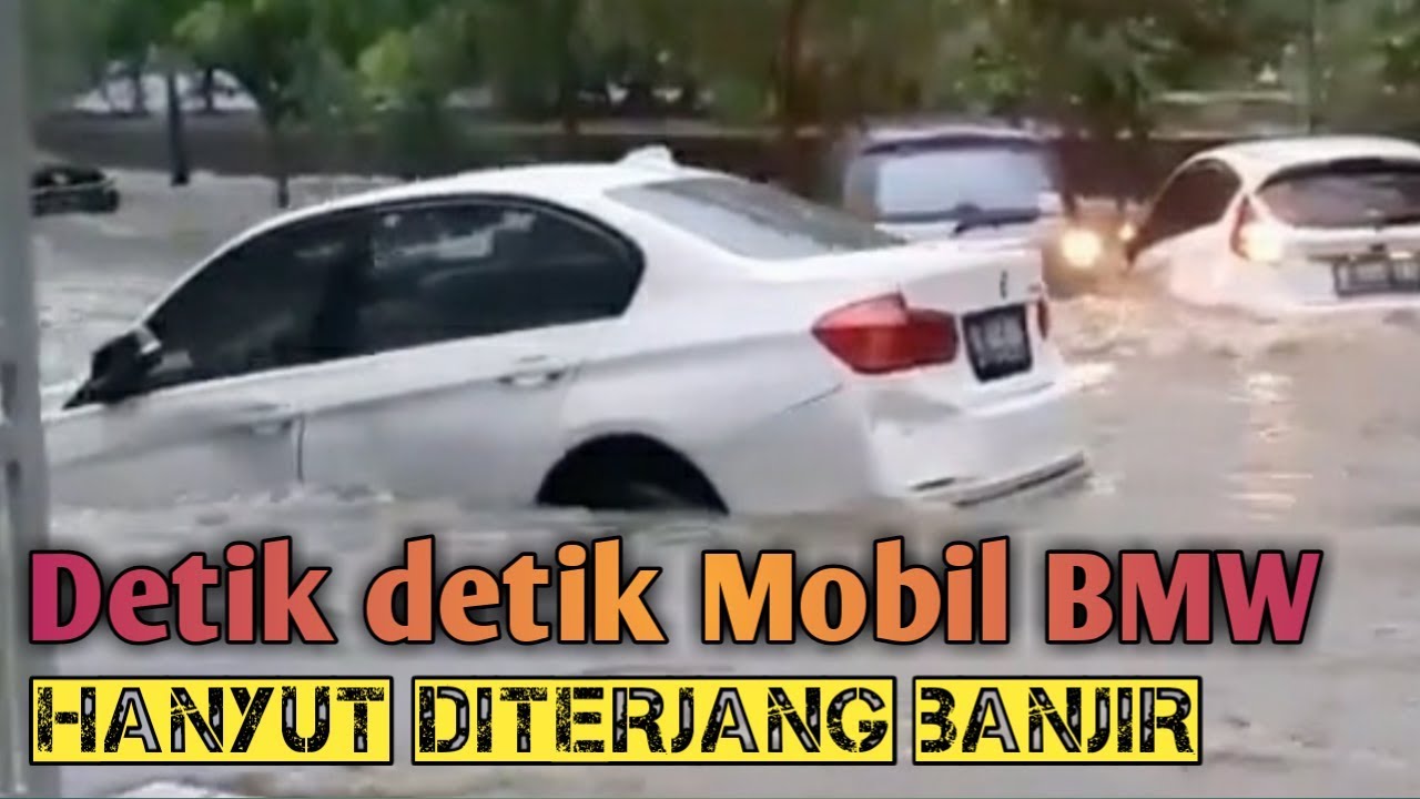  Mobil BMW hanyut  terseret Banjir di Tangerang selatan 