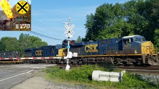 CSX Train Hauling Damaged Garbage Car on Flatcar