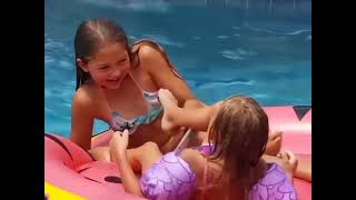 4 Girls Wrestle On A Pool Float In Slow Motion 4K
