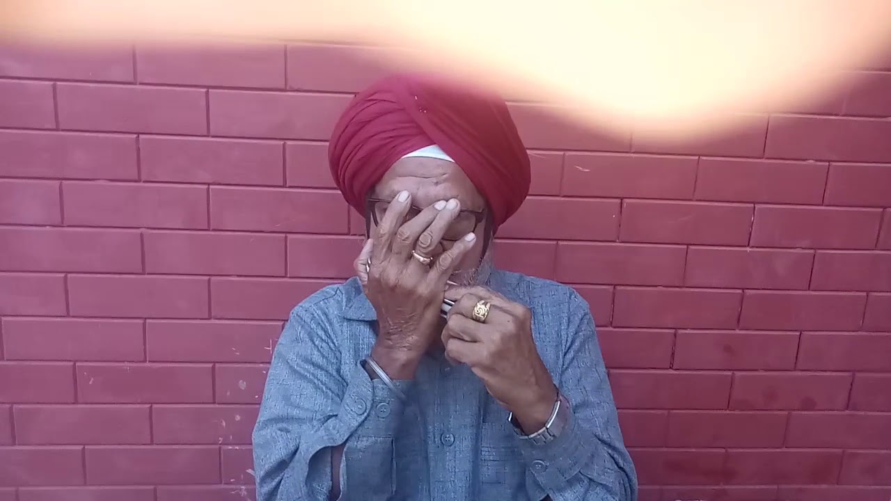 King of mouth organ music satnam wahe guru(1) YouTube