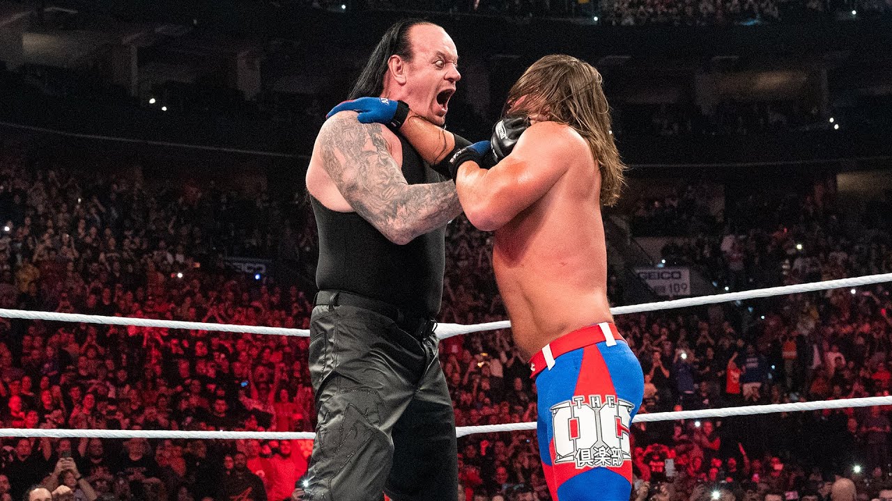 ⁣The Undertaker returns to attack AJ Styles: WWE Elimination Chamber 2020