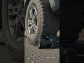 Car tire rolls over Canon EOS #car