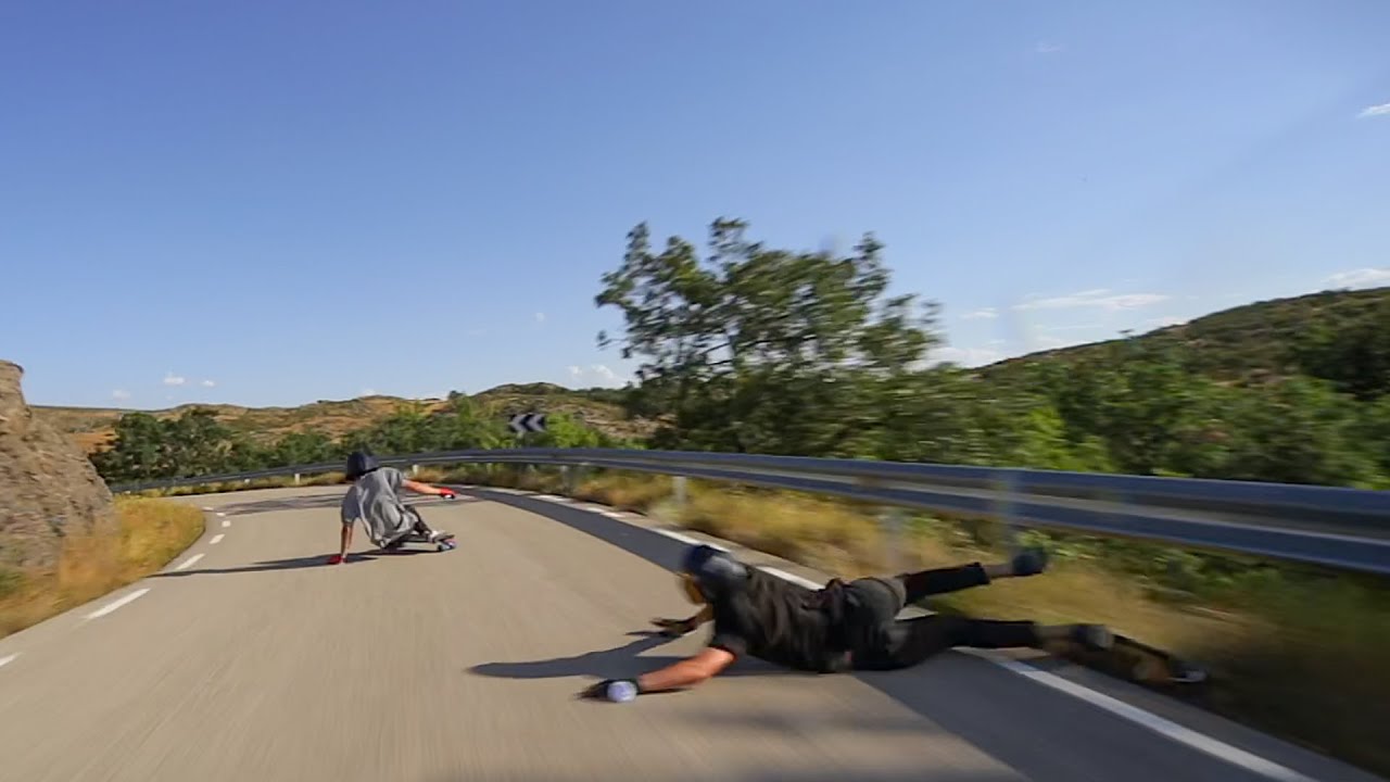 ⁣VERY SCARY - Skater smashes into guardrail during Downhill run at an amazing Speed!